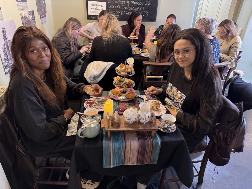 Student and her mother enjoying an afternoon tea