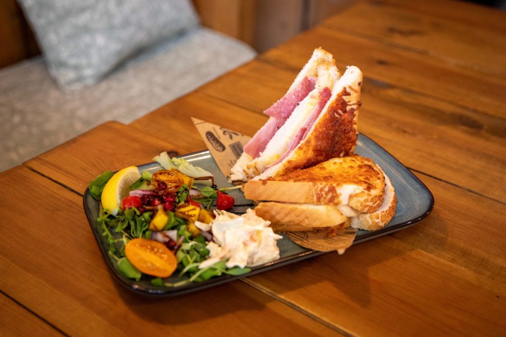 Toastie with a salad on a plate